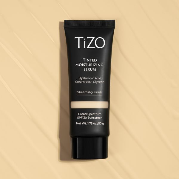 Тонуюча сироватка TiZO Tinted Moisturizing Serum SPF 30 Light TZ01 фото